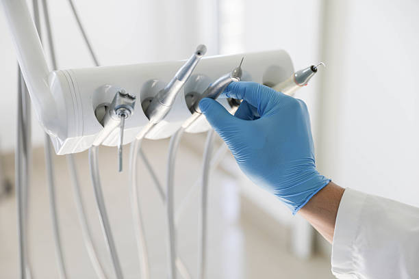 Professional Tooth Extraction technician working in Winnie, TX
